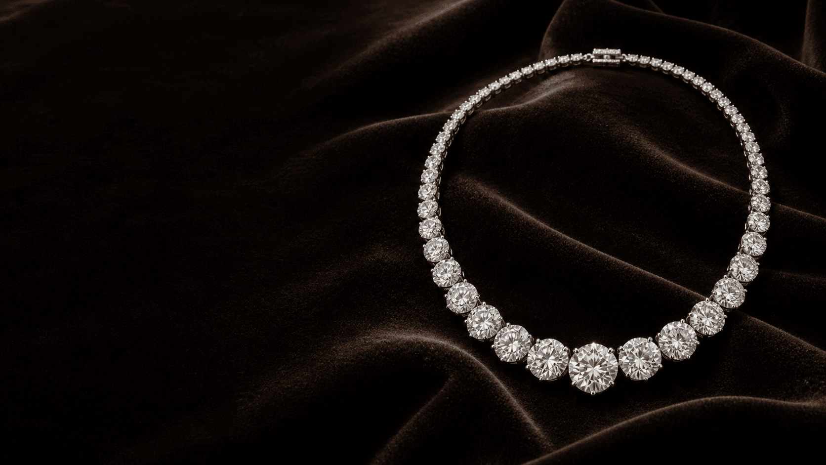 Graduated diamond necklace on deep black velvet