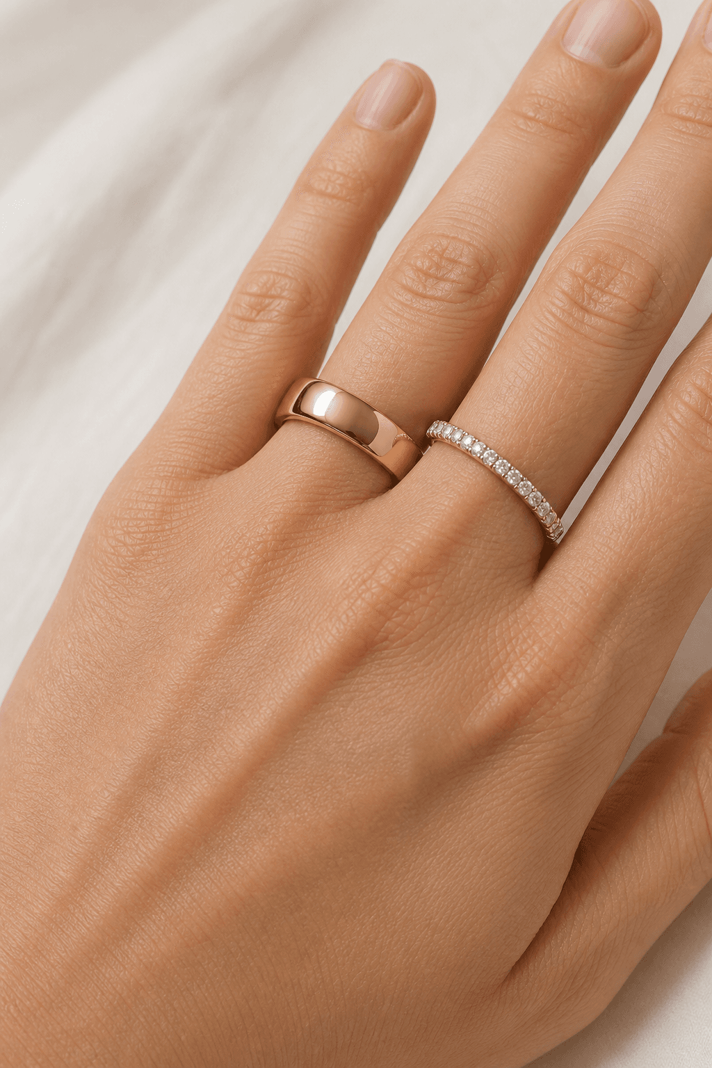 Gold and diamond bands worn together